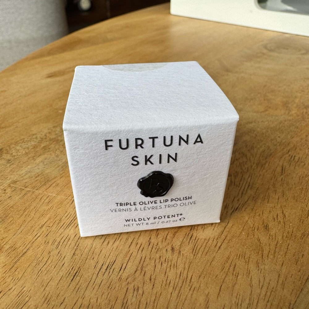 BRAND NEW! Never opened Furtuna Skin Triple Olive Lip Polish! 8 ml / 0.27 oz
